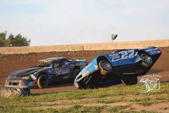 The blue #27 up on two wheels